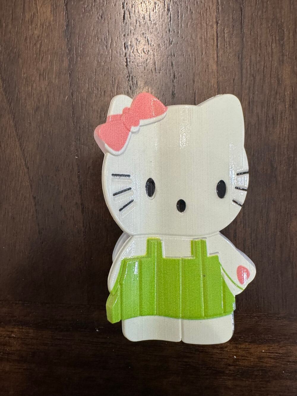 Large Hello Kitty hair clip claw with pink bow and green dress